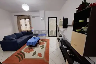 Apartment 1+1 for rent in Pallatet Cabej, Tirana, 65 m². Photo 1 of 3
